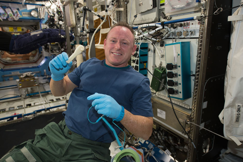 Nasa astronaut Barry Wilmore shows off a ratchet wrench made with a 3-D printer on the station. Credit: Nasa