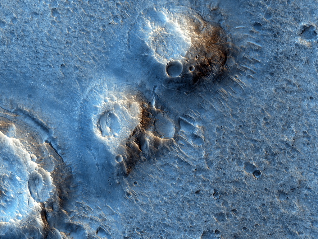 The view of Acidalia Plantia from the Mars Reconnaissance Orbiter's HiRise camera shows mounds created by lava-water interaction or mud eruptions. Credit: Nasa/JPL-Caltech