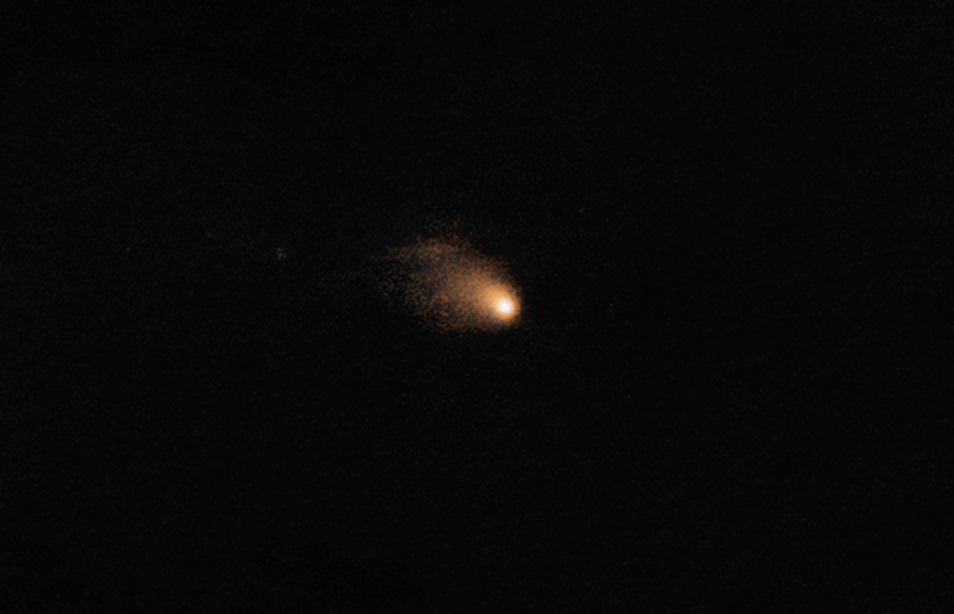 This smudge is the Comet 67P/C-G taken through the European Southern Observatory's Very Large Telescope last August. Scientists want to know how the large-scale changes in the comet's nucleus and tails relate to the local changes Rosetta (and Philae) observe. Credit: C. Snodgrass/ESO/Esa