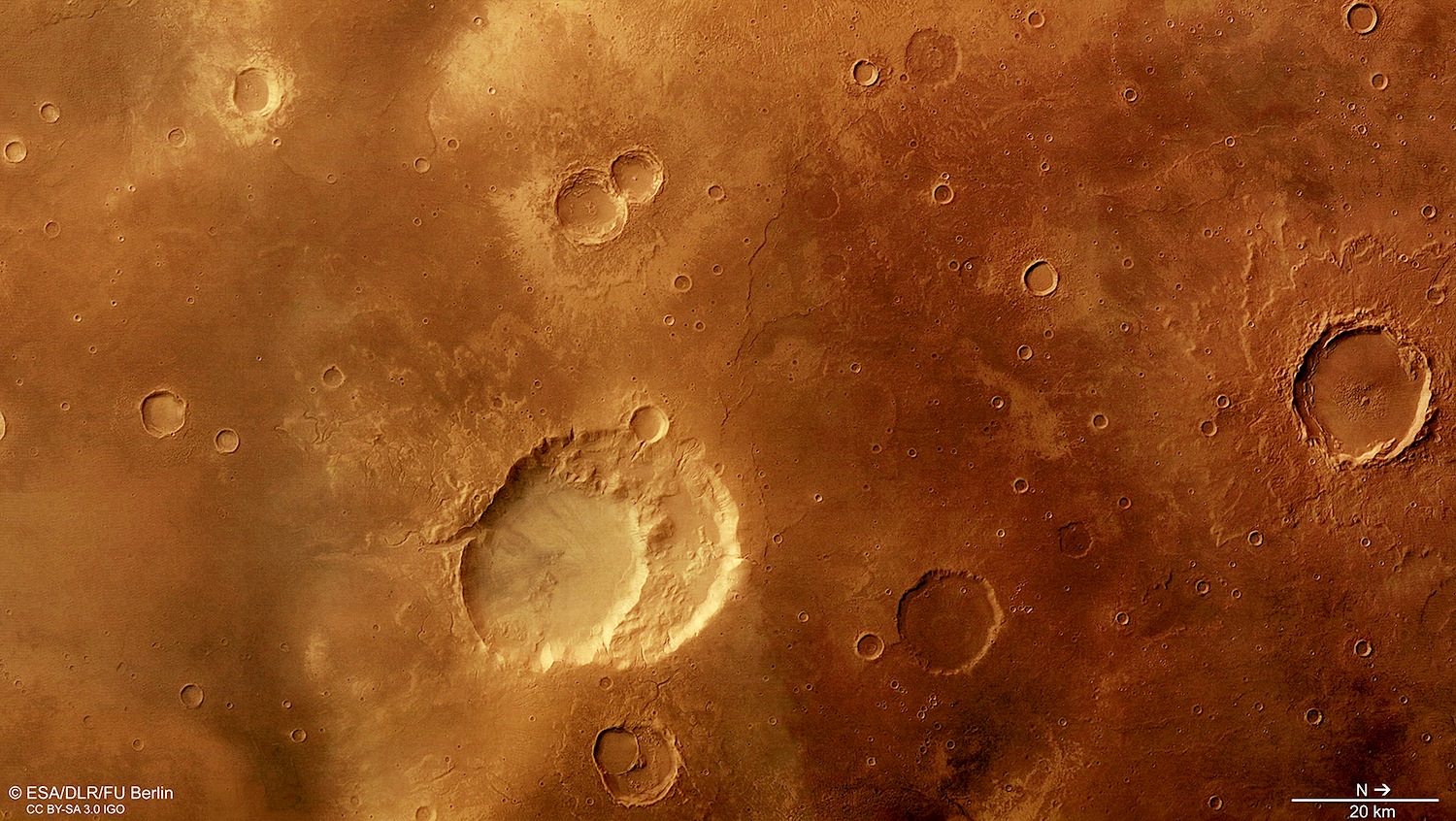 The 30 kilometer by 40 kilometer craters of Siloe Patera may be the remains of an ancient supervolcano. Similar to the supervolcano beneath Yellowstone National Park, a large volume of magma may have built up beneath the Martian surface. A massive eruption releasing more than 1000 cubic kilometers of material could explain the geology of Siloe Patera’s two nested craters. Credit: Esa/DLR/FU Berlin CC BY-SA 3.0 IGO