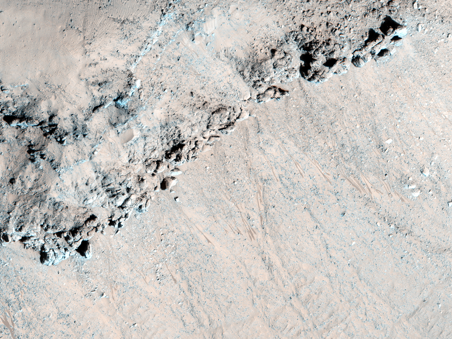 Steep slopes in this portion of Asimov Crater show signs of recurring slope lineae, seasonal phenomena that form in the summer and then disappear. Mysteriously recurring slope lineae only appear in certain locations. Credit: Nasa/JPL-Caltech/University of Arizona