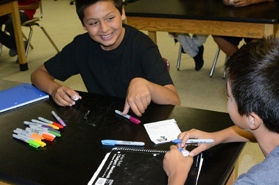 7th Grade Noli Indian School students prepare their "PongSat" ping-pong balls for launch. Credit: Soboba Casino