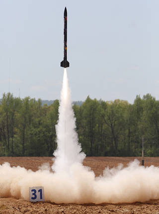 The red soil of an Alabama farm served as launch site for student-designed rockets. Credit: Nasa/MSFC/Emmett Given