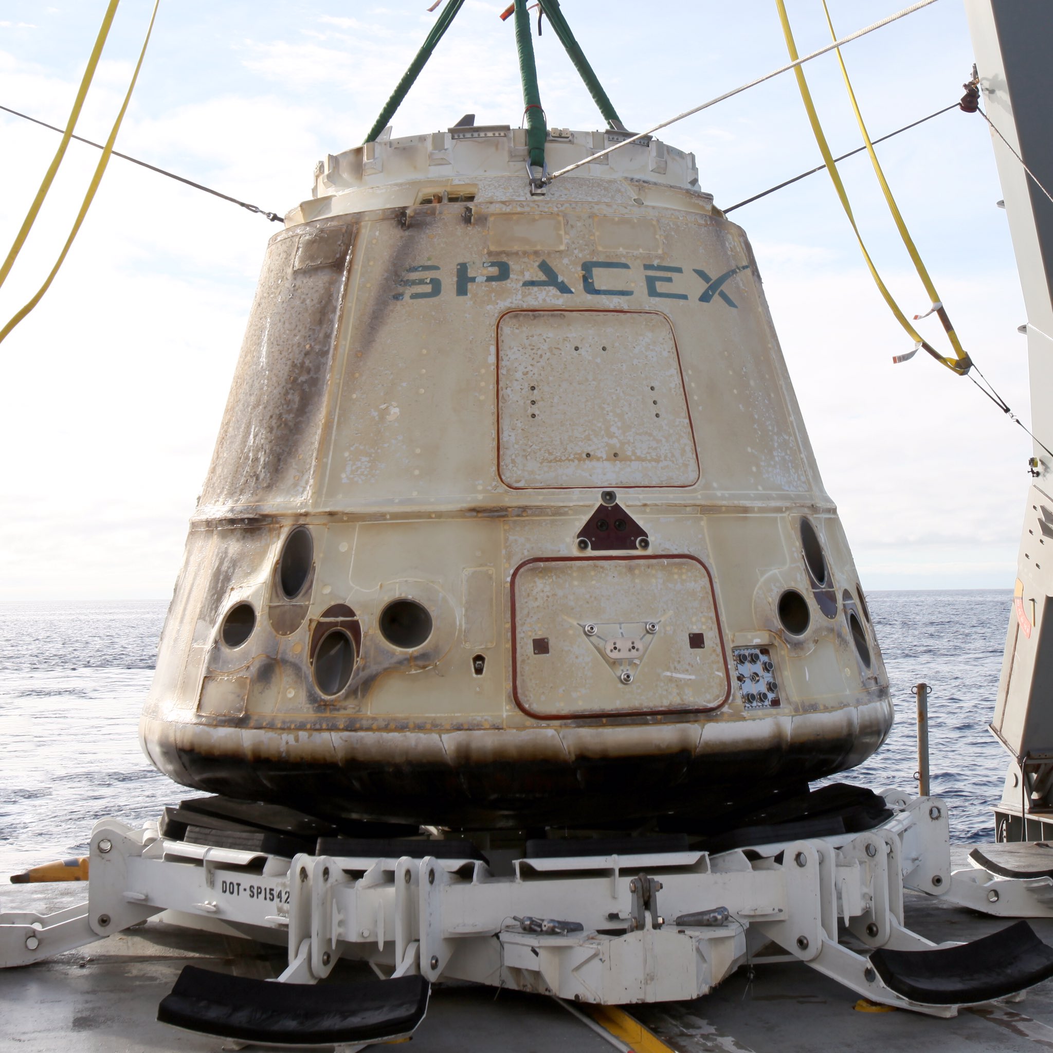 A little charred on the outside, but the student experiments that rode the Dragon back from space should be fine. Credit: SpaceX