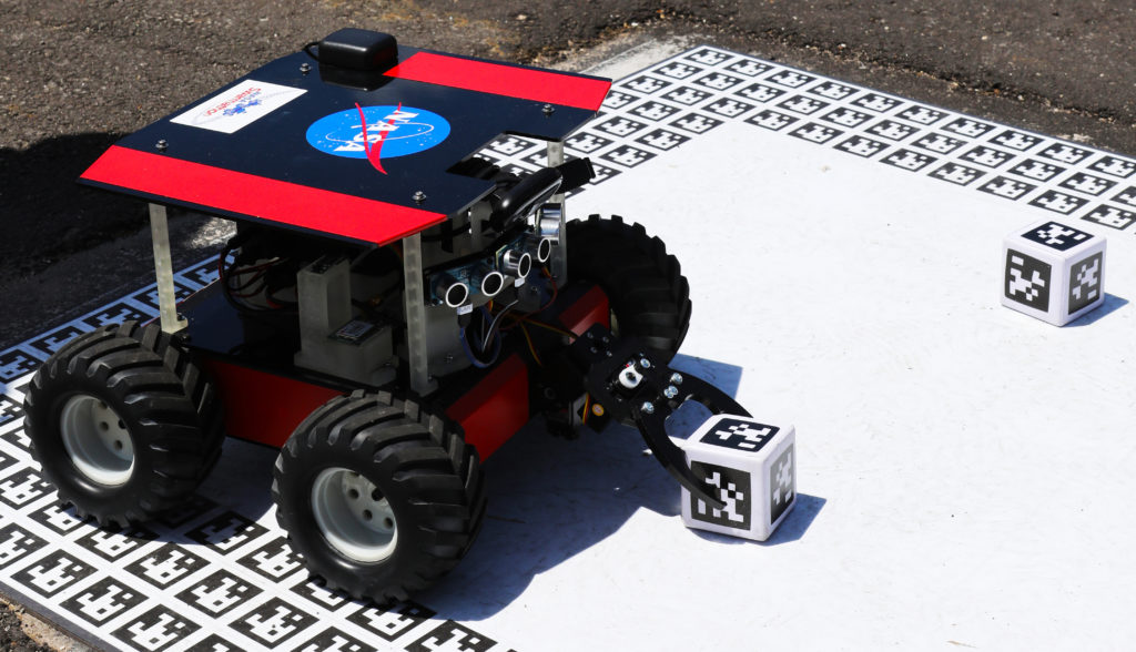 Swarmathon competitors had to program a dozen robots like this one to collect "samples". Future exploration missions may use many small rovers rather than one big rover. Credit: Nasa/ KSC