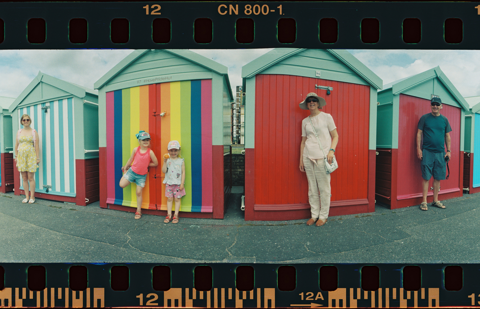  Here’s my family against beach huts in brighton.   kind of fun shot! 
