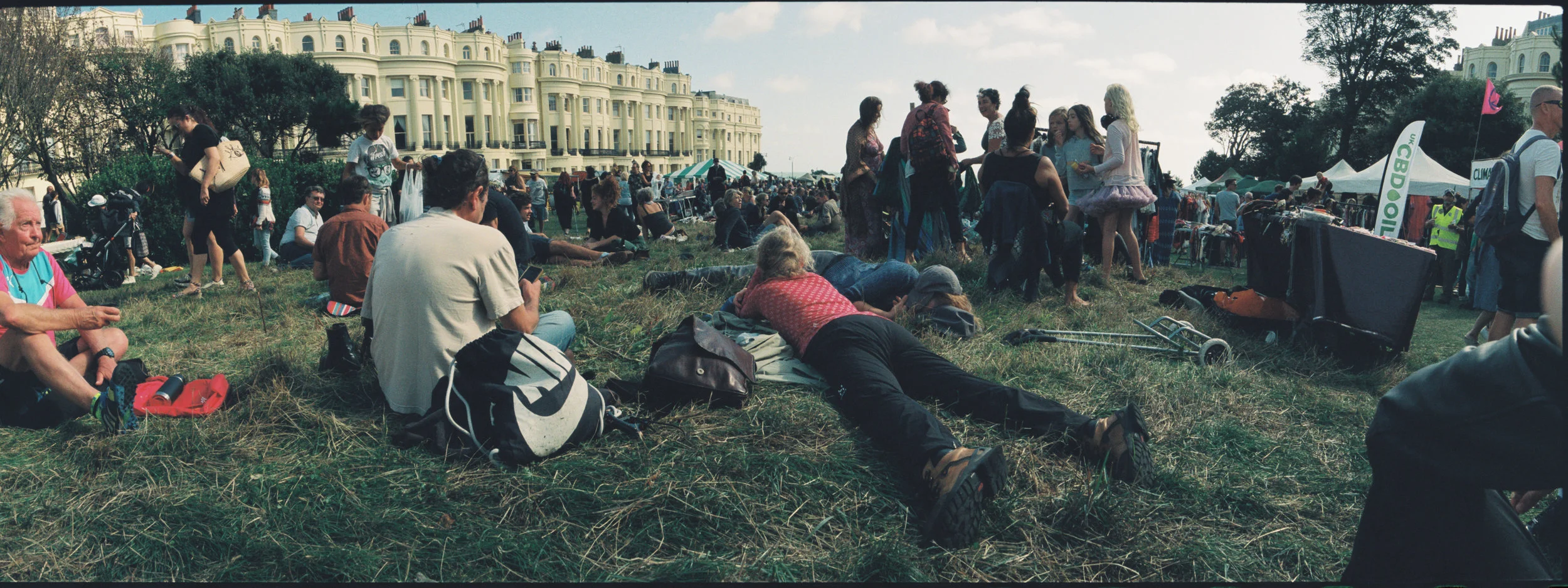 I think the composition here works well with the legs of the woman on the grass leading the eye into the shot. Should have got rid of the person on the right of the frame and more of the guy on the left. The shadows are a bit muddy in this one but I don’t mind it too much.