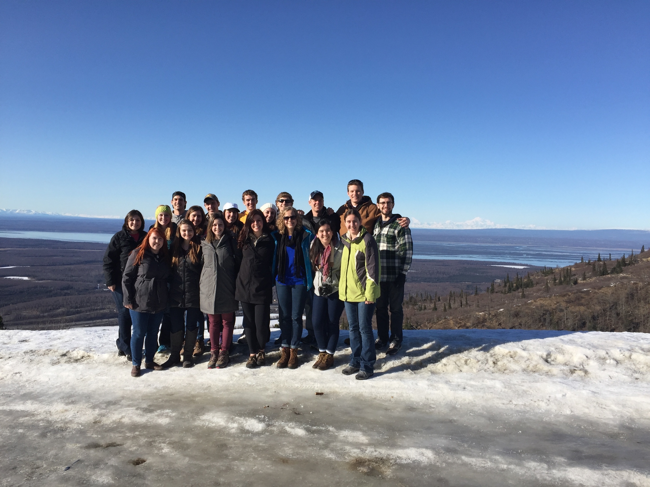 The whole crew standing in front of Mt. Denali (far off in the distance on the right)