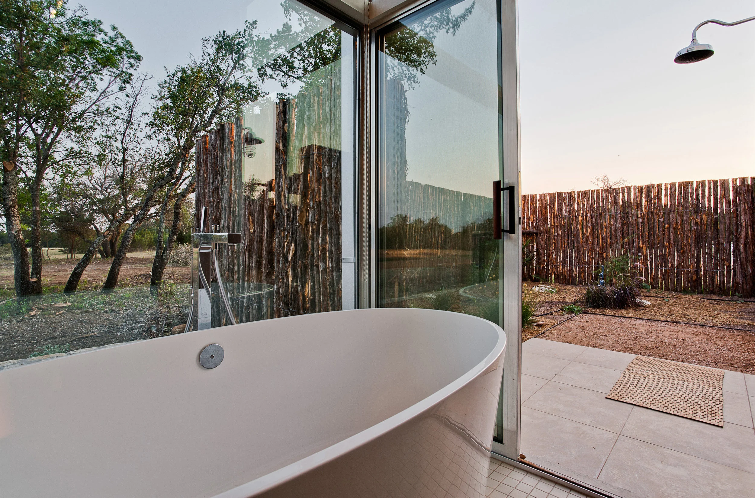 outdoor shower off of master bath… view from tub to pasture beyond