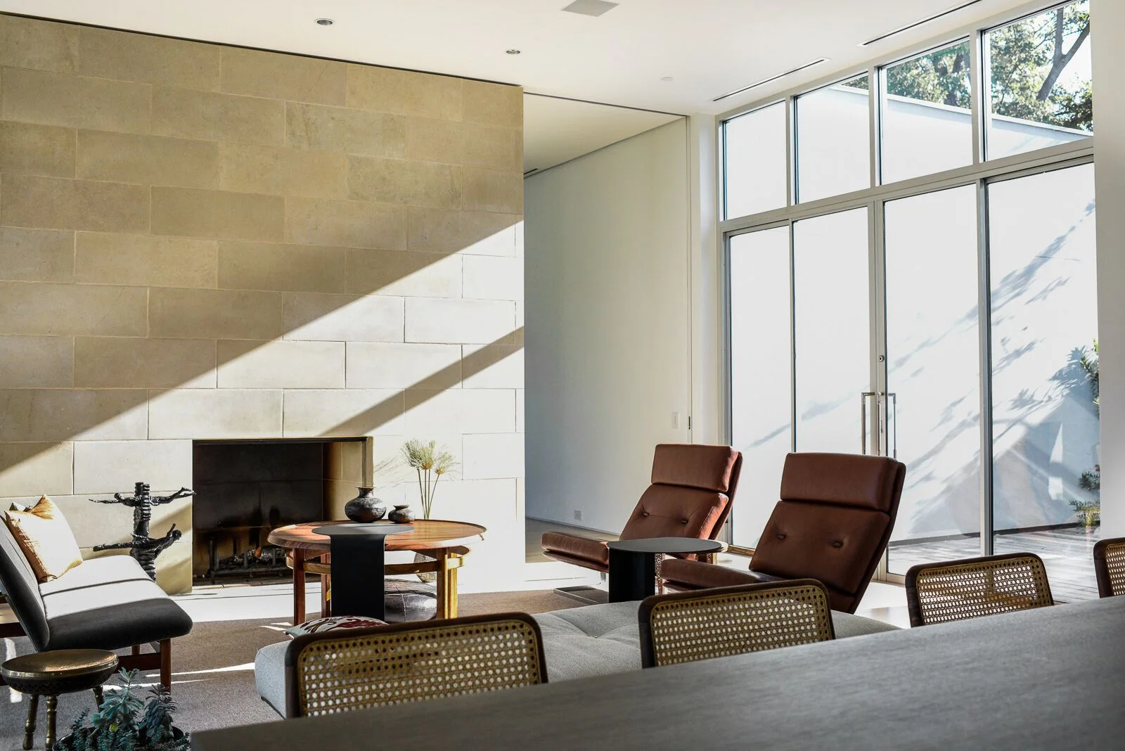 living area:  leuders limestone / bleached white oak