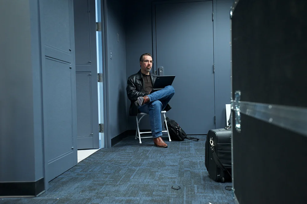 Dr. David Ferrucci awaits analytics results from a WATSON sparring match, one day prior to the championship.