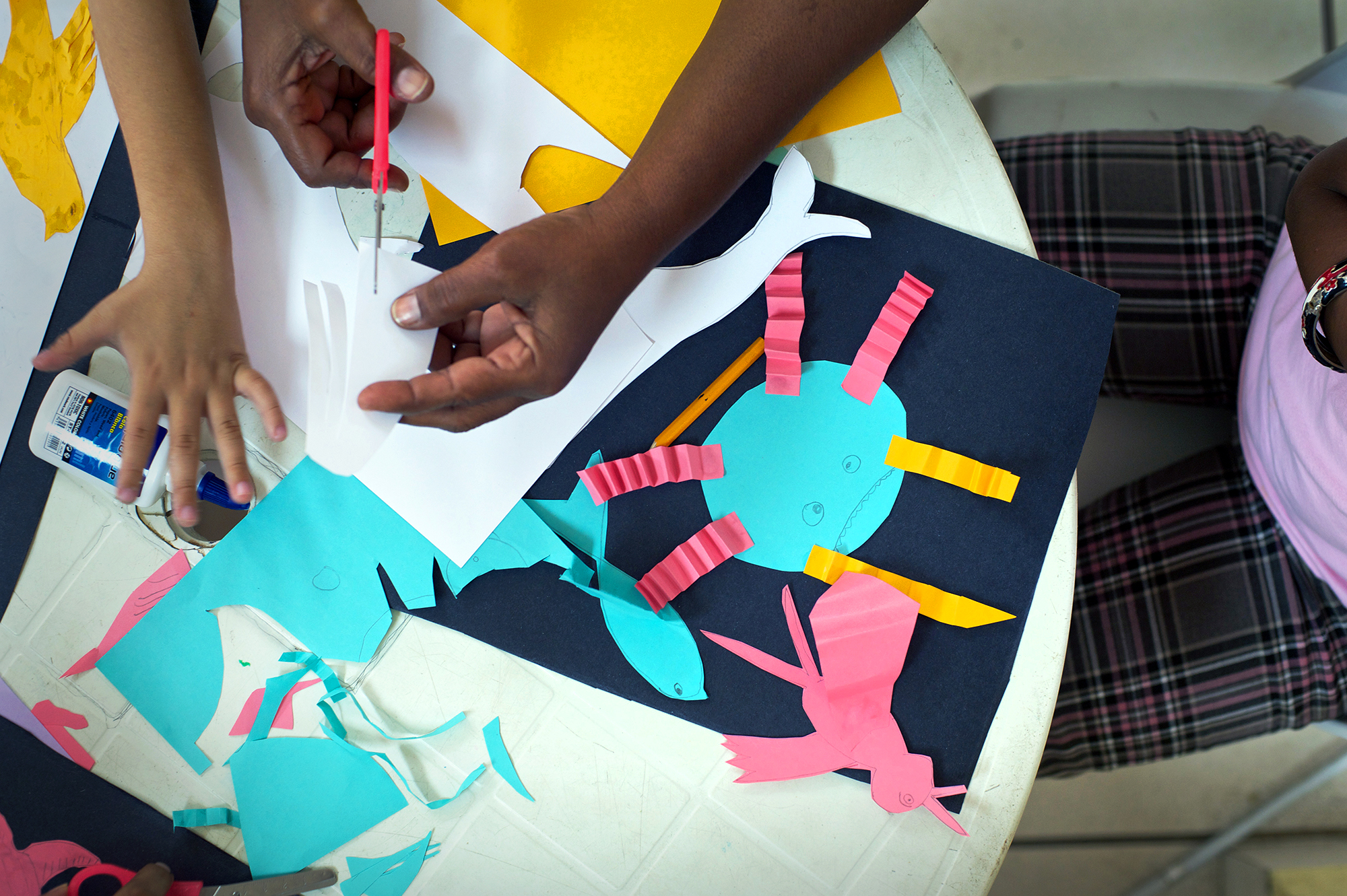 Students are encouraged to express themselves through tactile creative exercises.