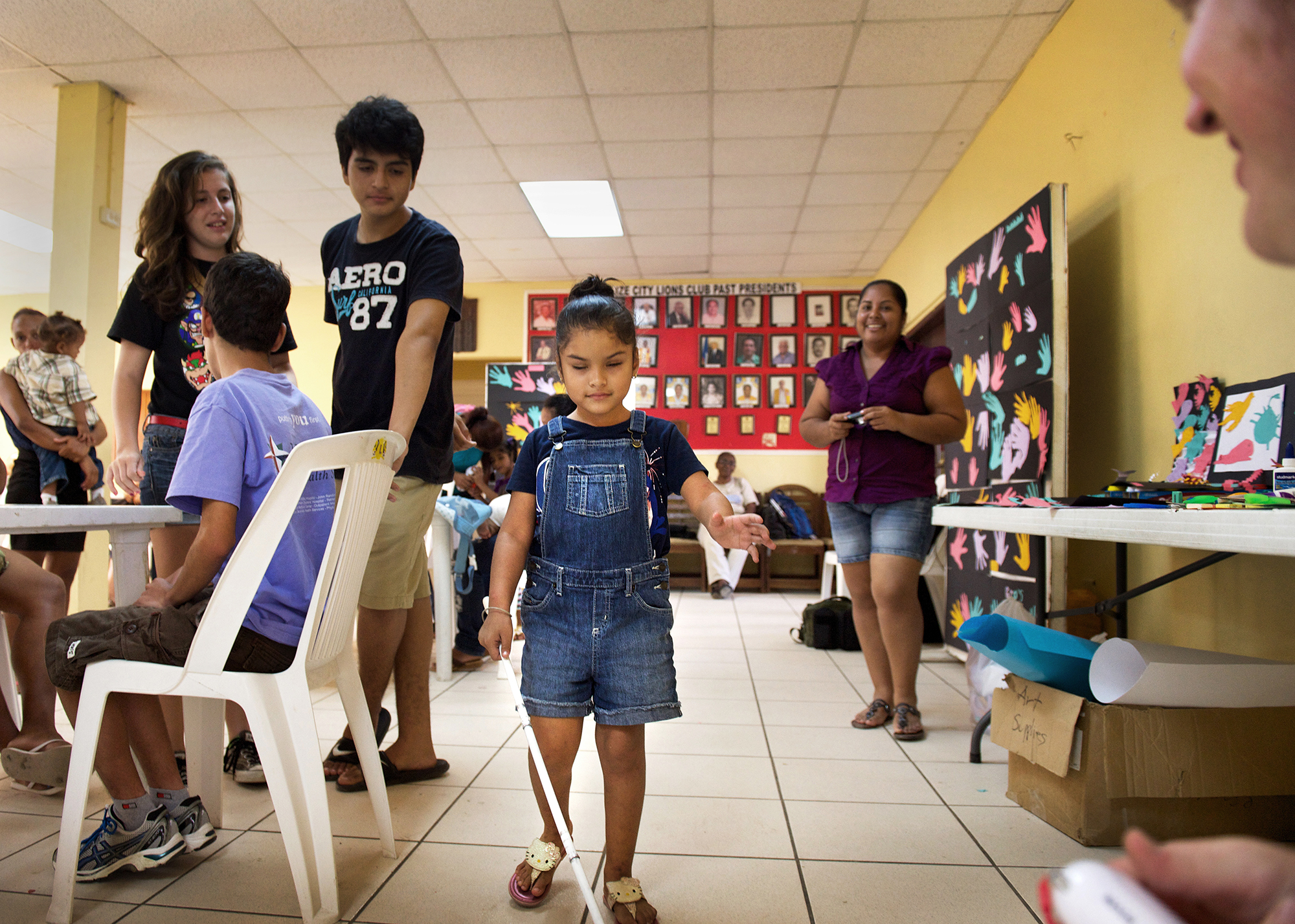  A BCVI summer camp student receives her radio. 