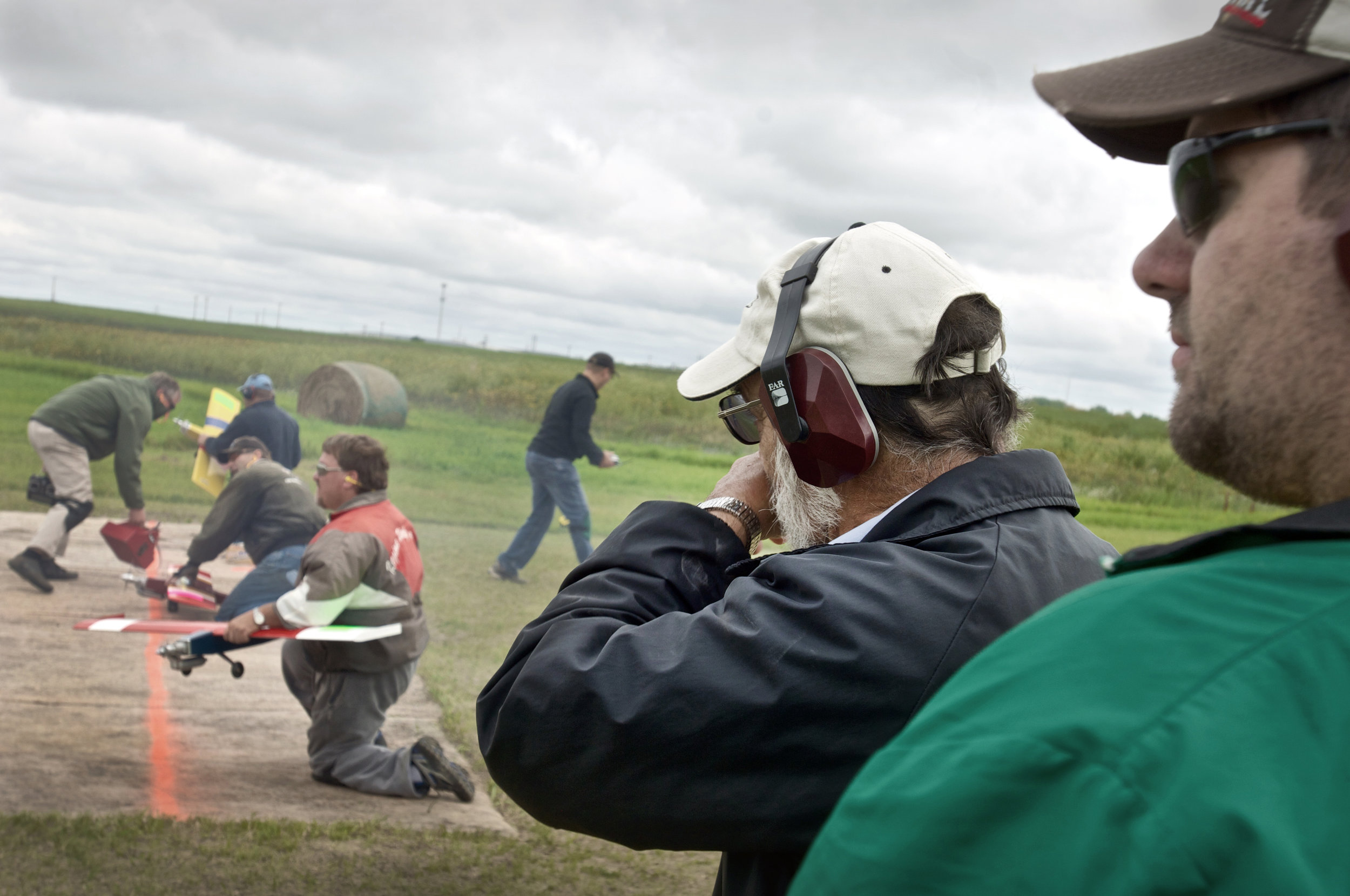 A race begins. Flying teams consist of a radio control pilot and a spotter.