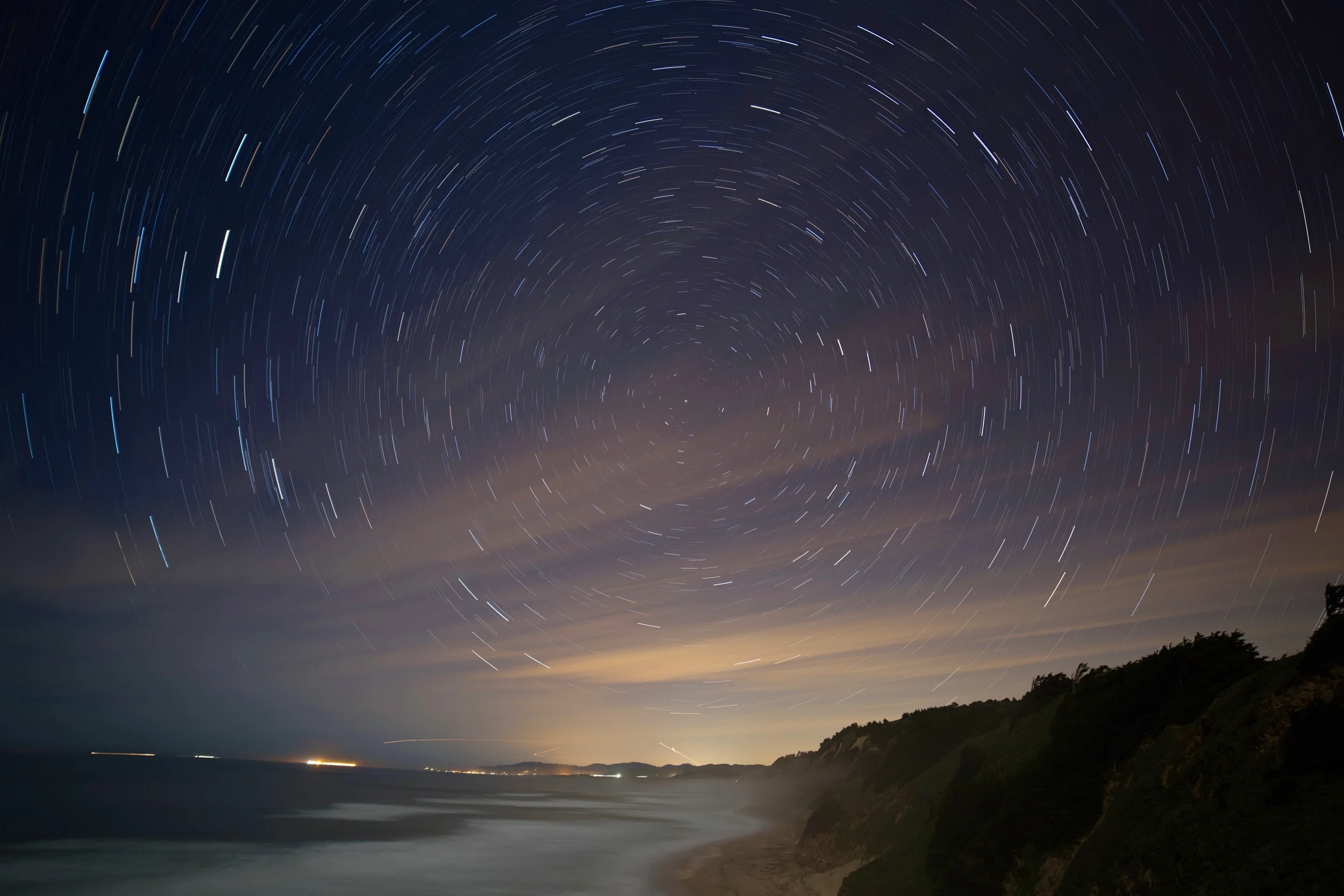 So I turned the camera north and got star trails. The lights are Half Moon Bay.