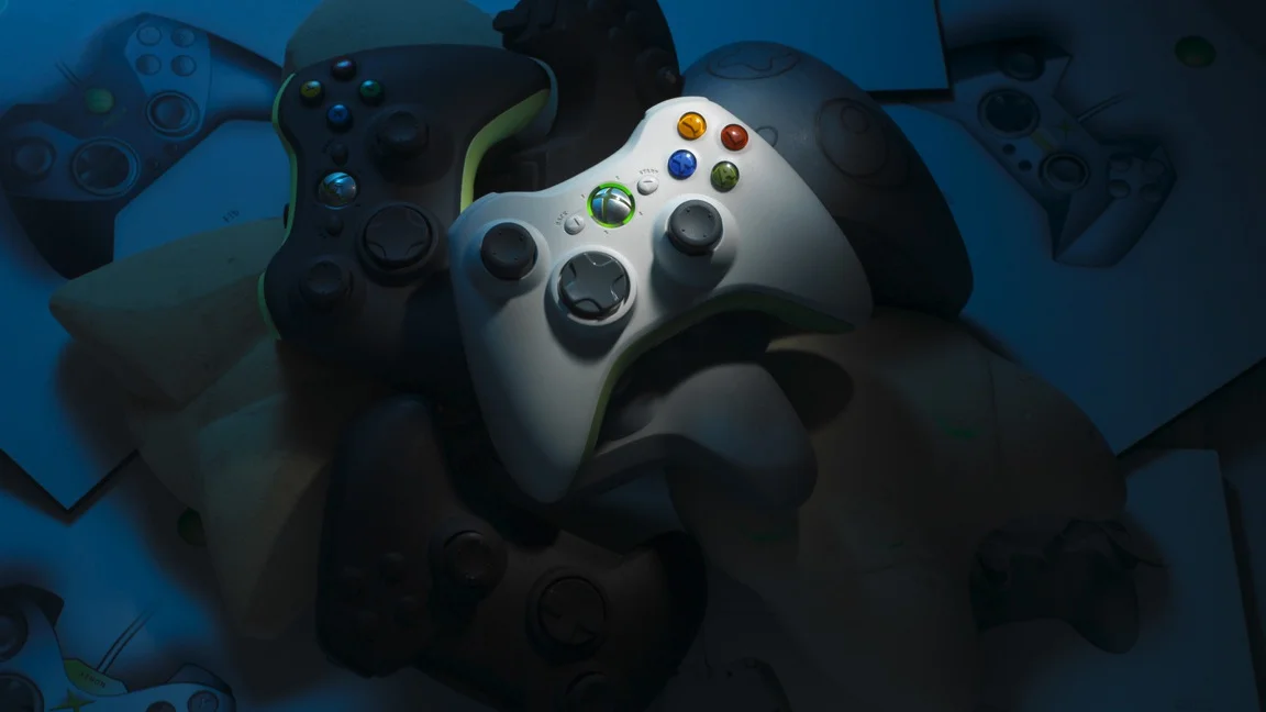 The Xbox 360 controller sitting on a pile of prototypes, models, and sketches. 