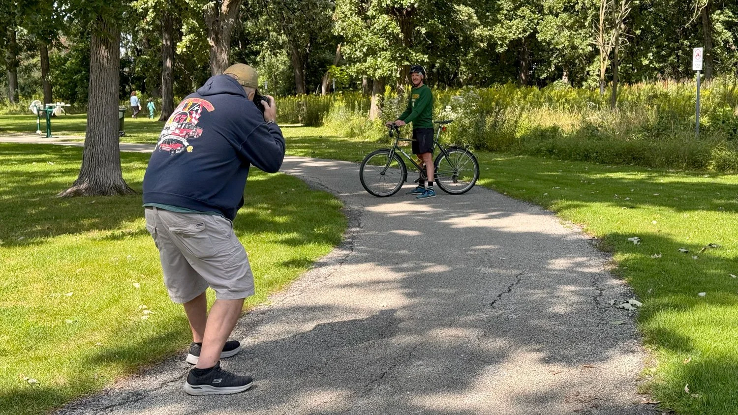 Behind the scenes photo 1 of sports and aviation photographer Peter Wagner capturing a photo of Ride Illinois ED David Simmons on his bicycle