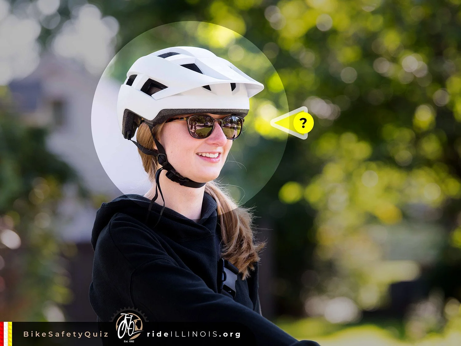 Teenage girl wearing bicycle helmet - Ride Illinois Bike Safety Quiz image