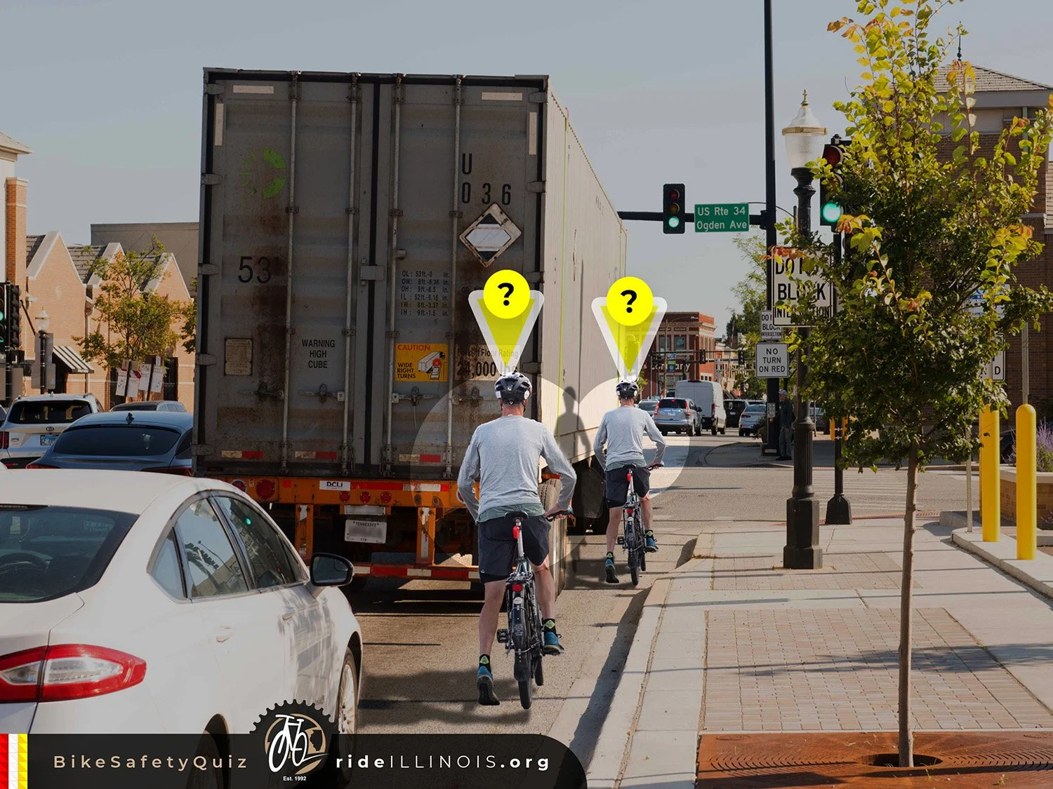 Cyclist at the right and wrong position next to a semi turning right at an intersection