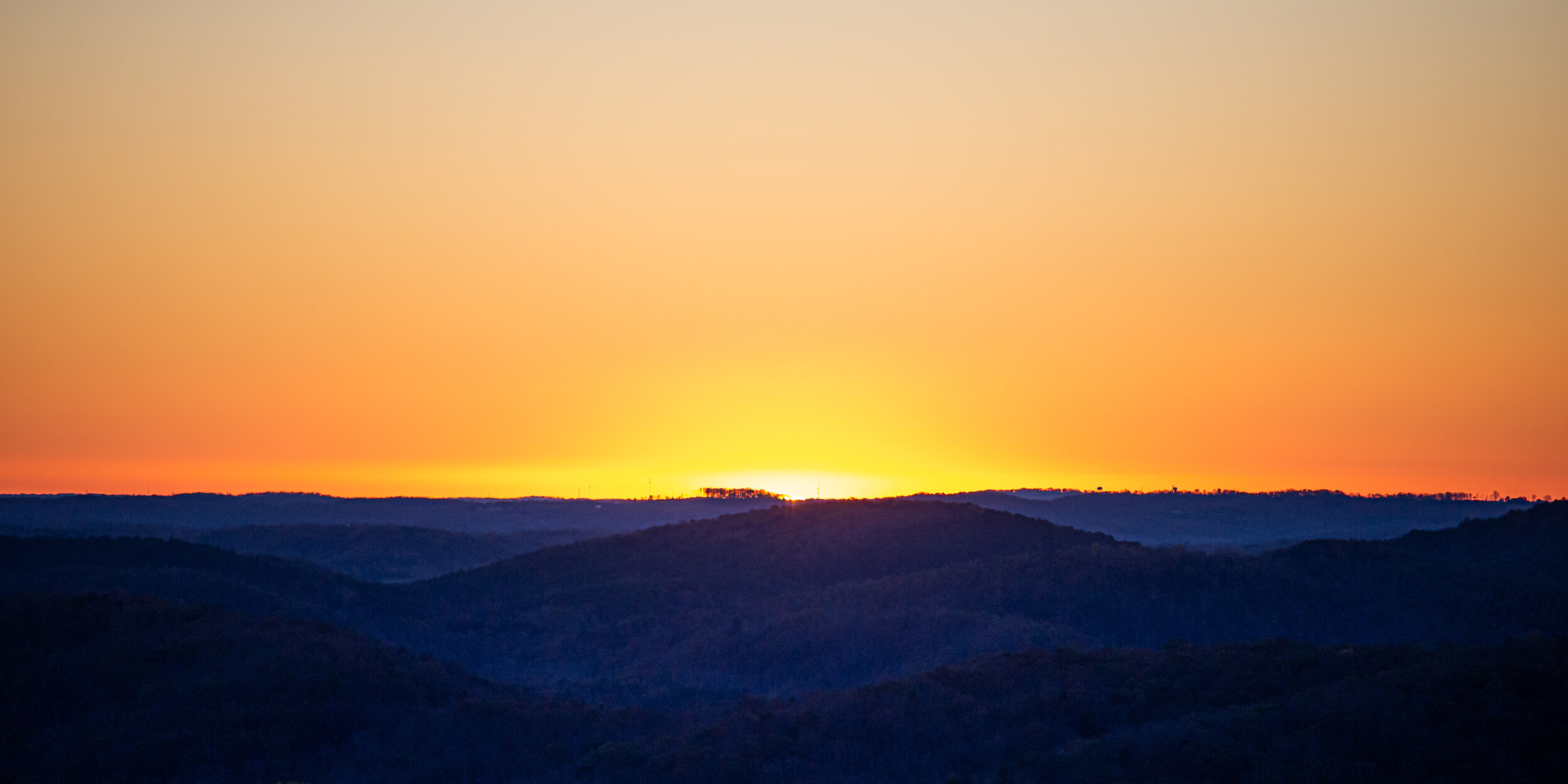 a burst of white on a colorful horizon