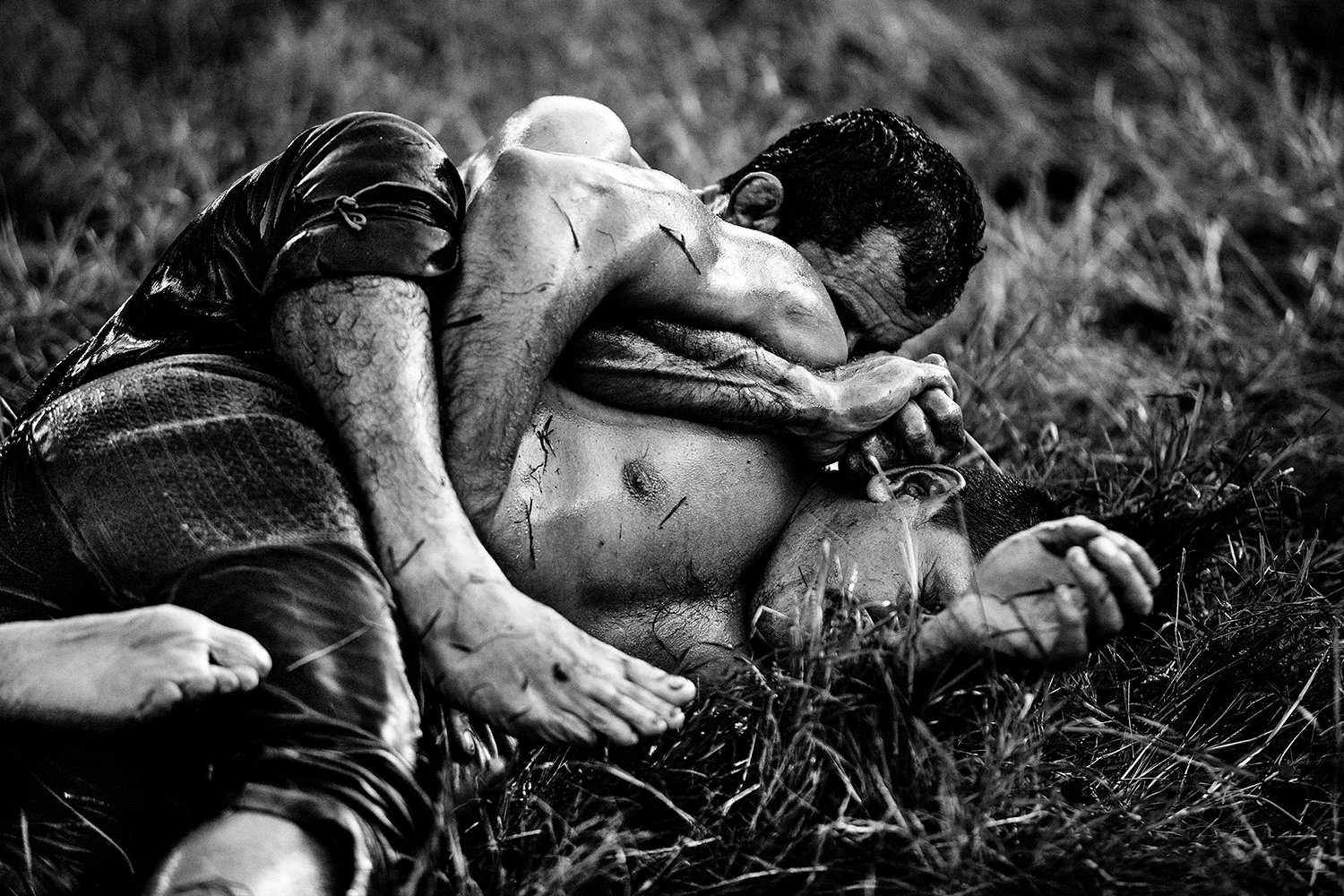 Oil Wrestler in Nelson Hold