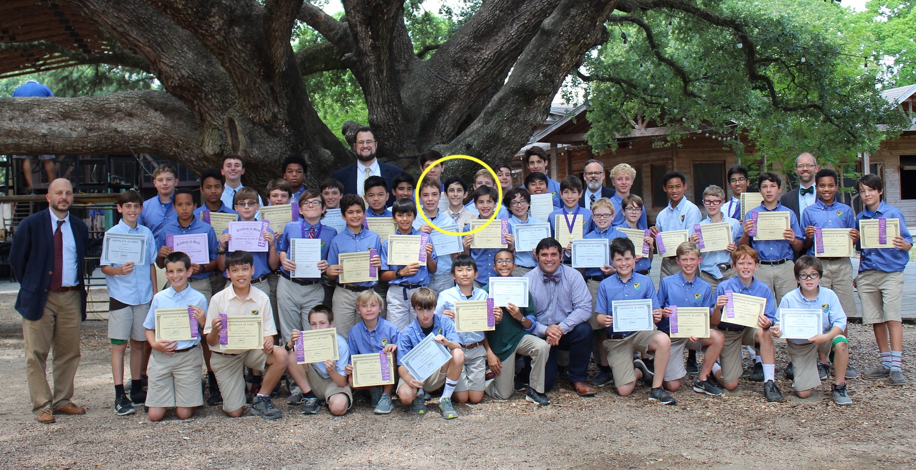 Martin Saenz (circled in middle) among the “throng” of middle school students receiving National Latin Exam awards this year at Western.