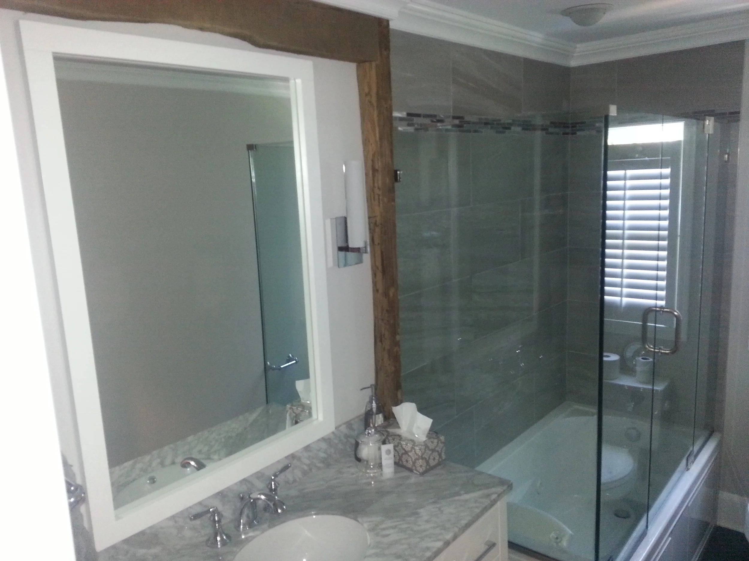 Smoke damaged bathroom after restoration by Groundswell Contracting