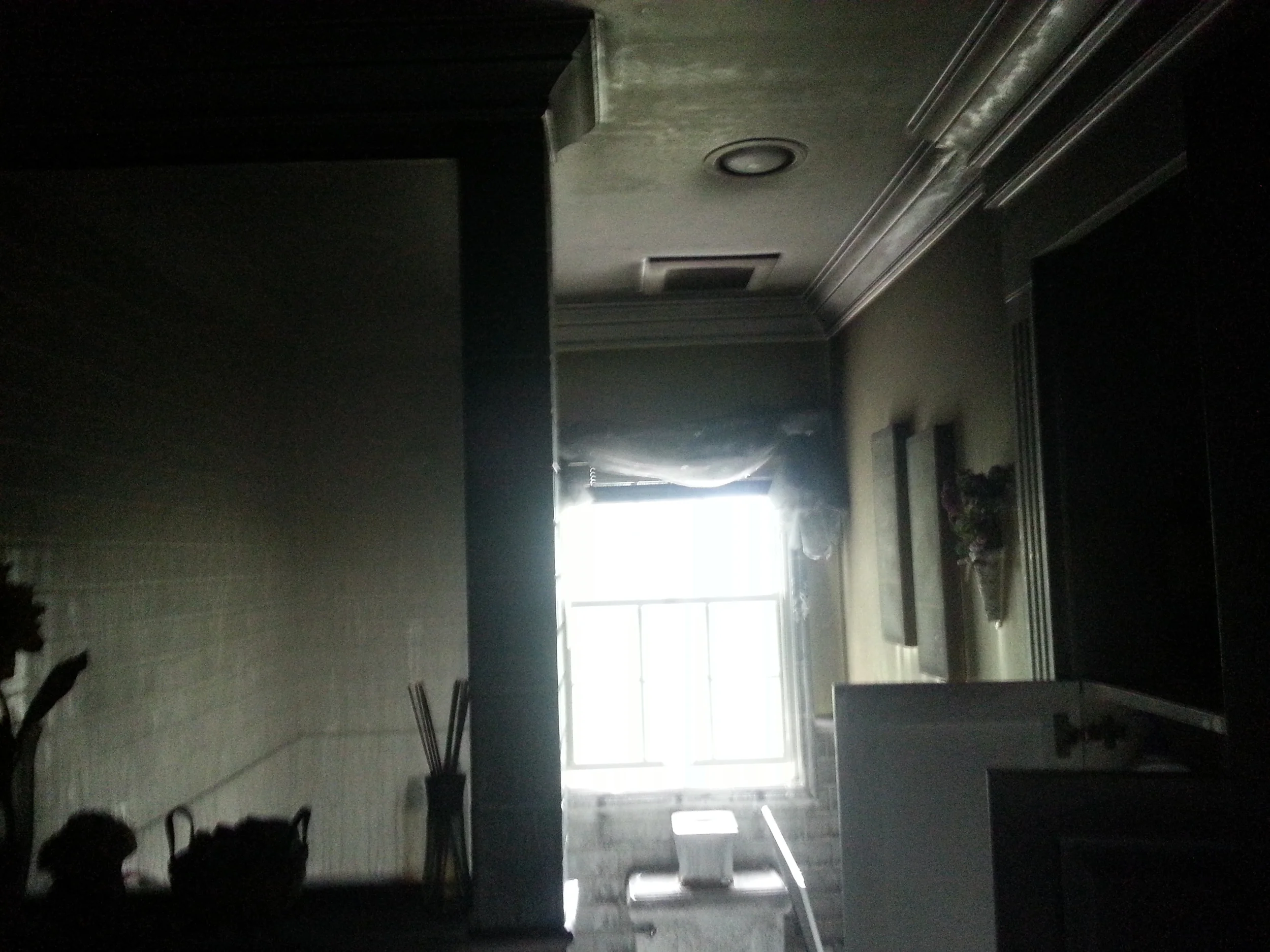 Smoke damaged bathroom before restoration by Groundswell Contracting