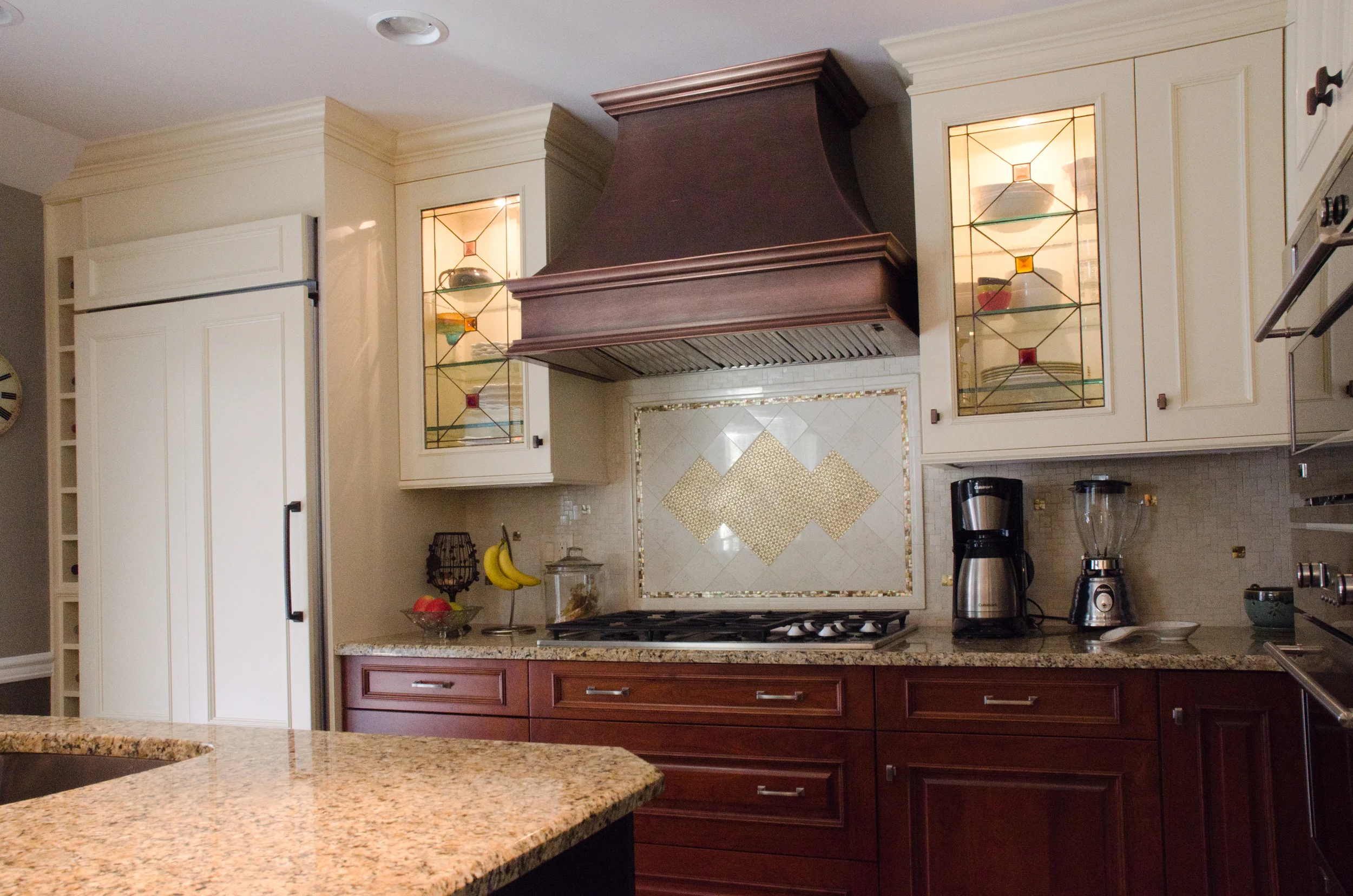 Fire and smoke damaged Wood Mode kitchen after restoration by Groundswell Contracting