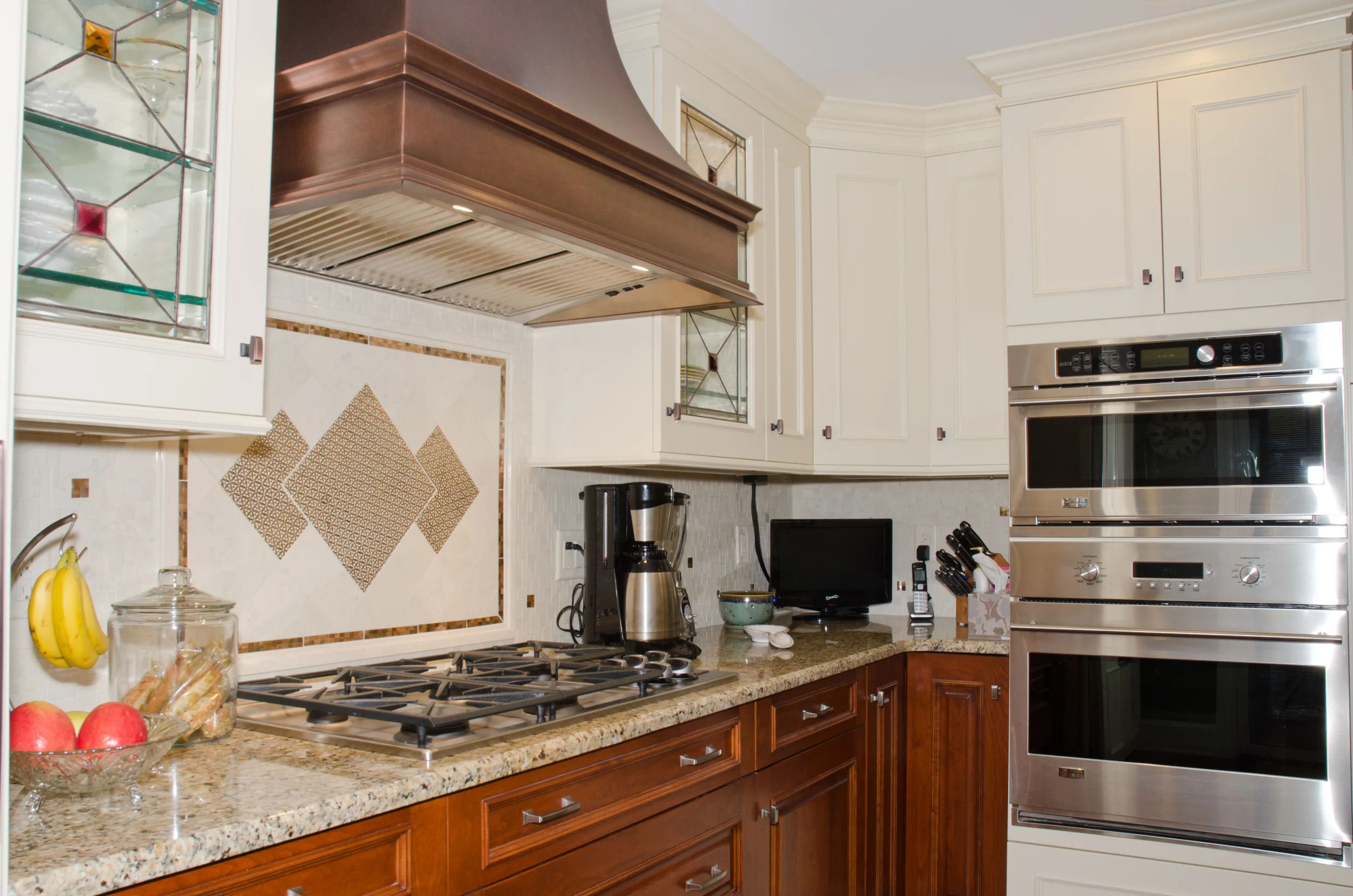 Fire and smoke damaged Wood Mode kitchen after restoration by Groundswell Contracting
