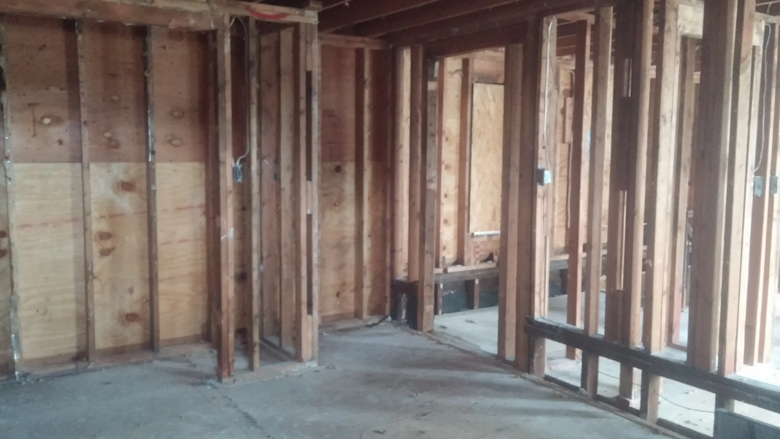 Fire damaged interior before restoration by Groundswell Contracting
