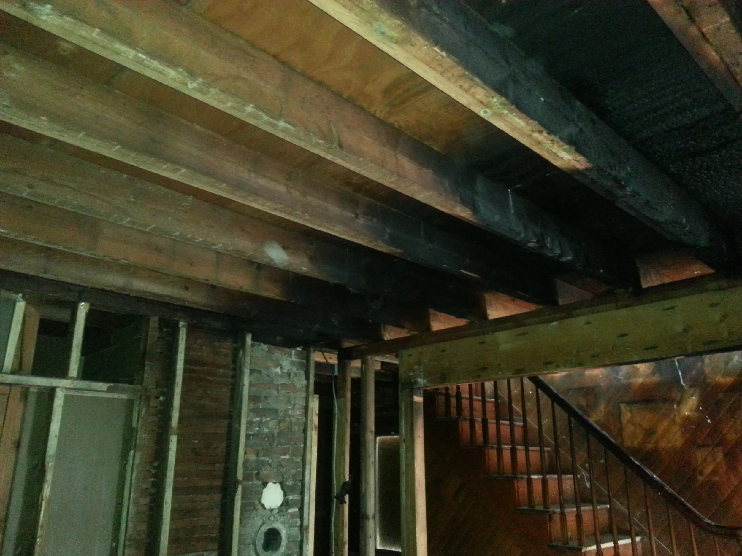 Fire damaged interior before restoration by Groundswell Contracting
