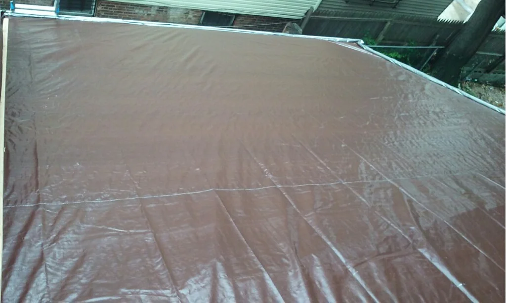 Roof tarping by Groundswell Contracting