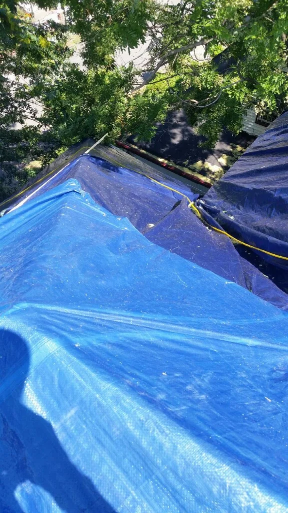 Roof tarping by Groundswell Contracting