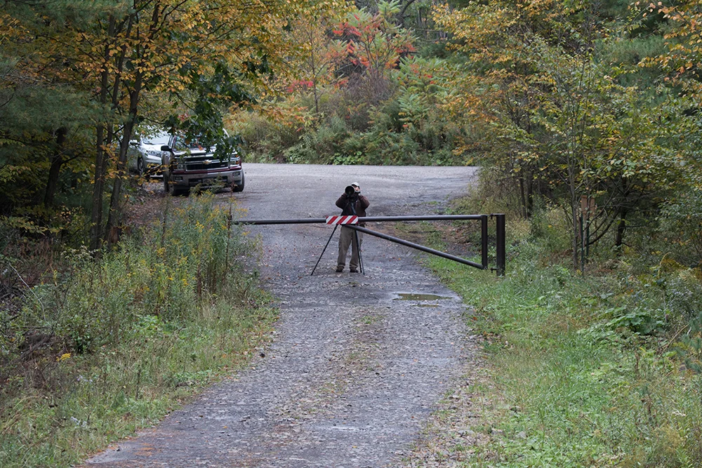 Tom Dorsey documenting the heroes from a distance after the successful Porcupine adventure.