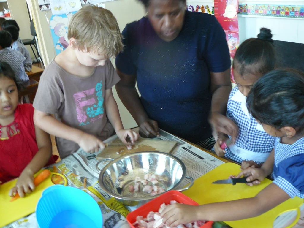 chopping chicken for soup.JPG
