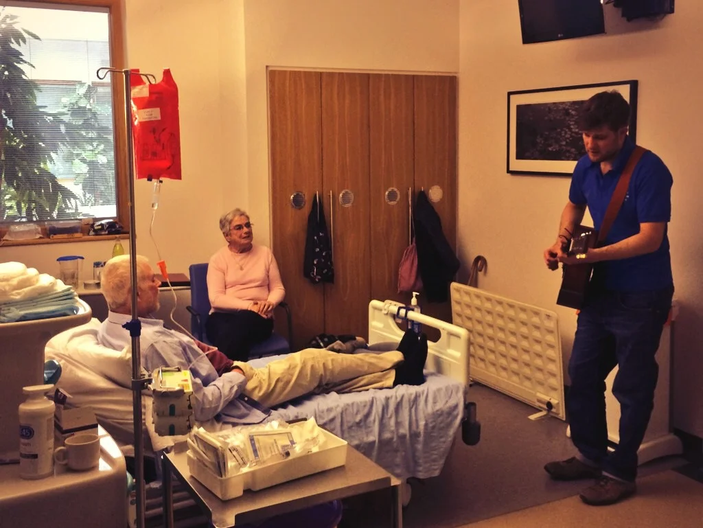 Adam with patient.jpg
