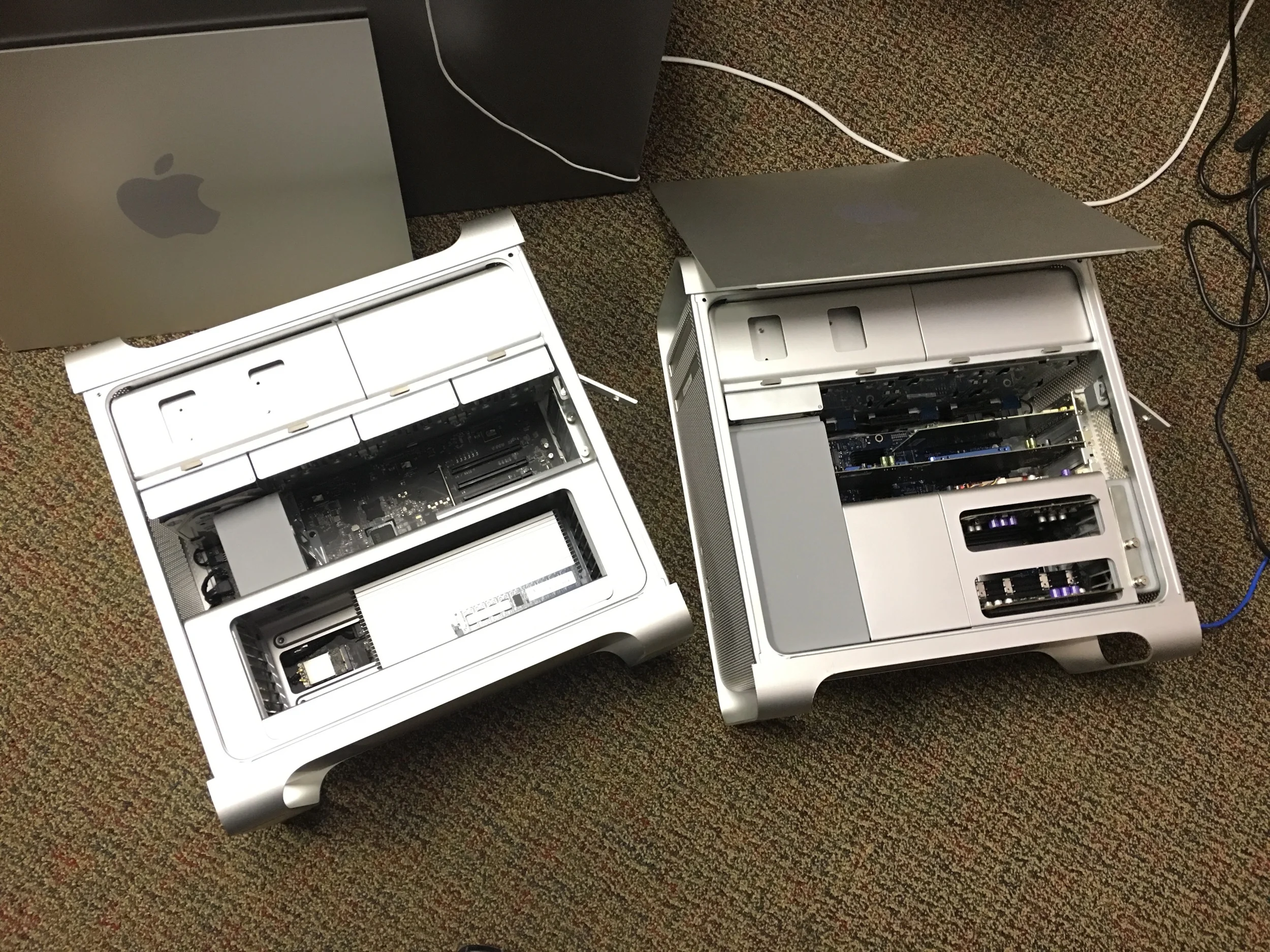 New 2009 Mac Pro on the left, busted 2008 model on the right.