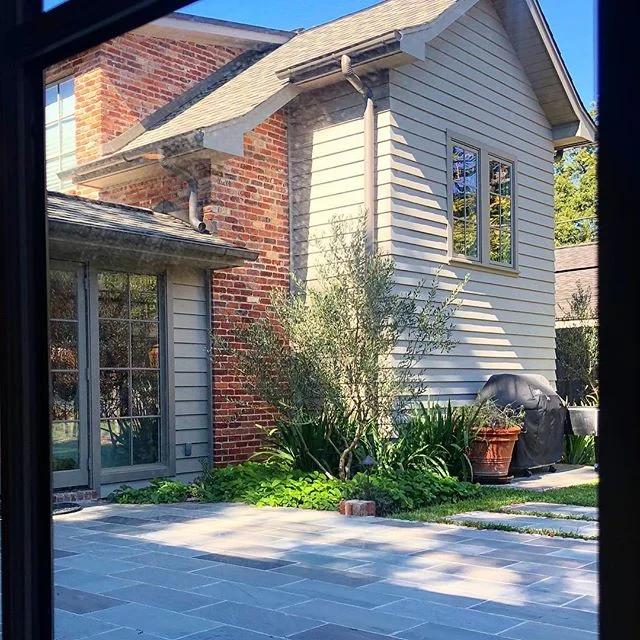 Garage addition viewed from the living room at our Longmont Reno. PM: @potts5457 Architect: @cusimanoarchitect .
.
.
.
.
#houstonbuilder #apbuilders #custombuilder #remodel #renovation #addition #homeaddition #garageaddition #bluestone #artisansiding