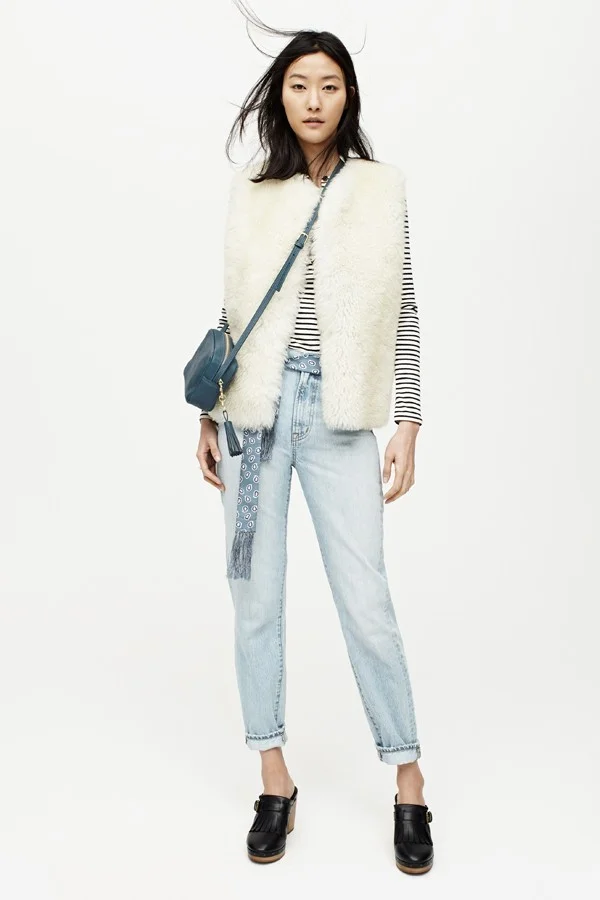 white shearling vest with henley and jeans.jpg