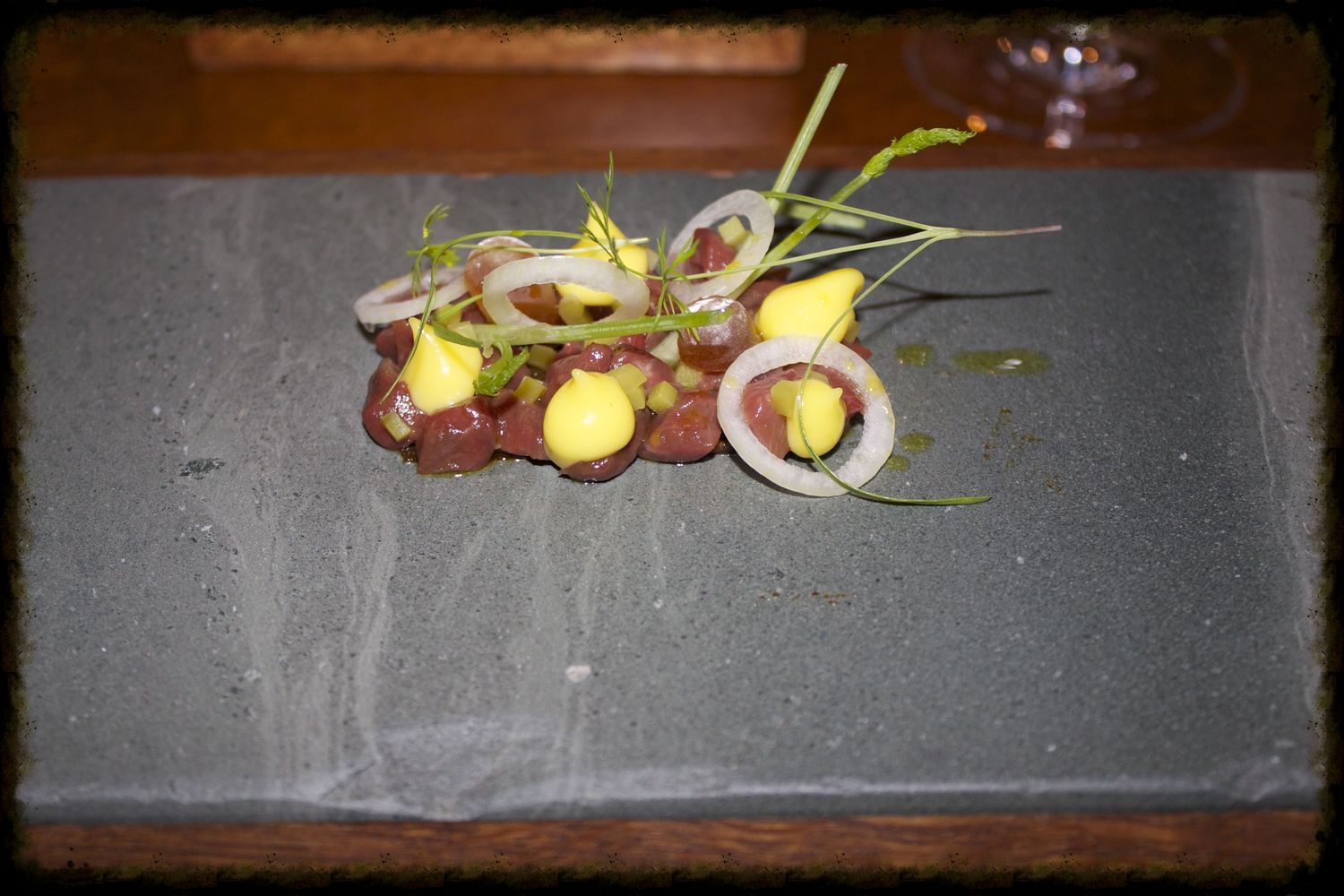 Raw valley venison, charcoal oil, mustard and fennel sweets