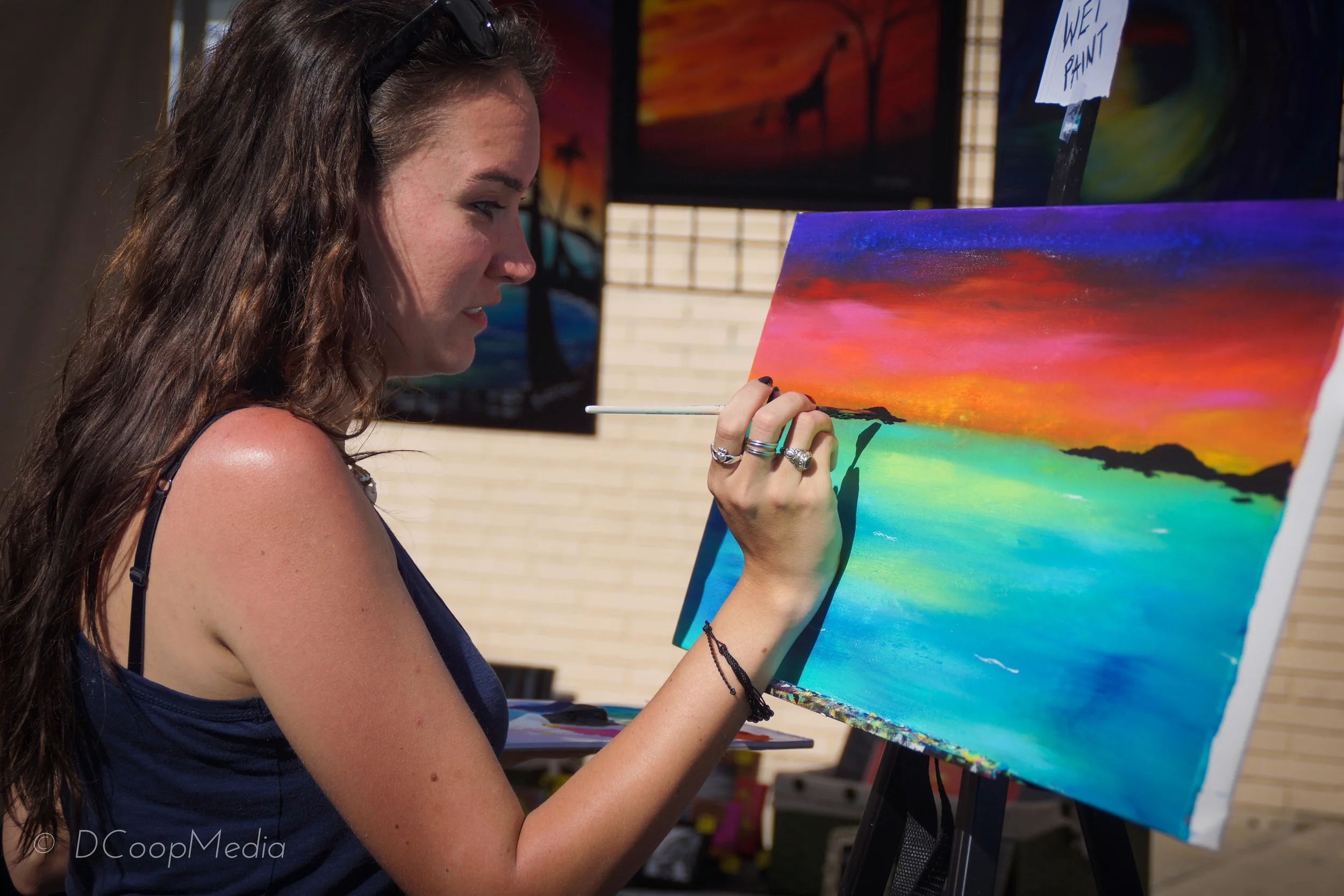 Artist Krystal Dyer concentrating on the horizon.