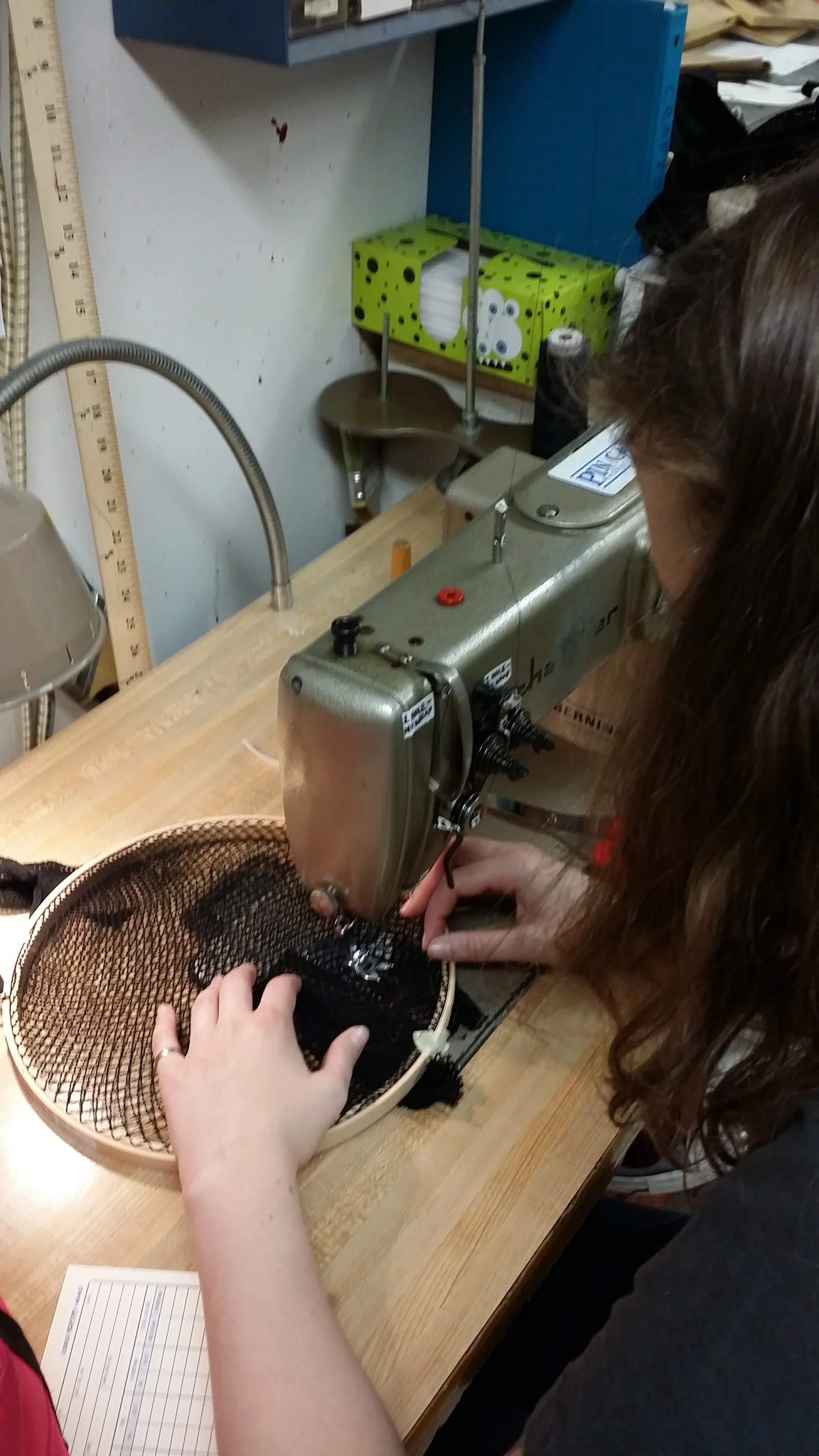 My assistant, Kaitlyn Kaufman, making fishnet gloves for an extra large set of hands