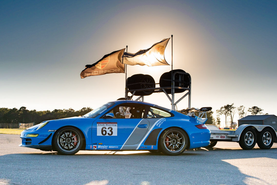 Testing some dynamic range here...shot it under exposed in the foreground then recovered it in LR. #63 #porscheracing #porsche911 #porsche997 #supercar #racing #sportscar #porscheclub @blacktacho #wing #porscheflag