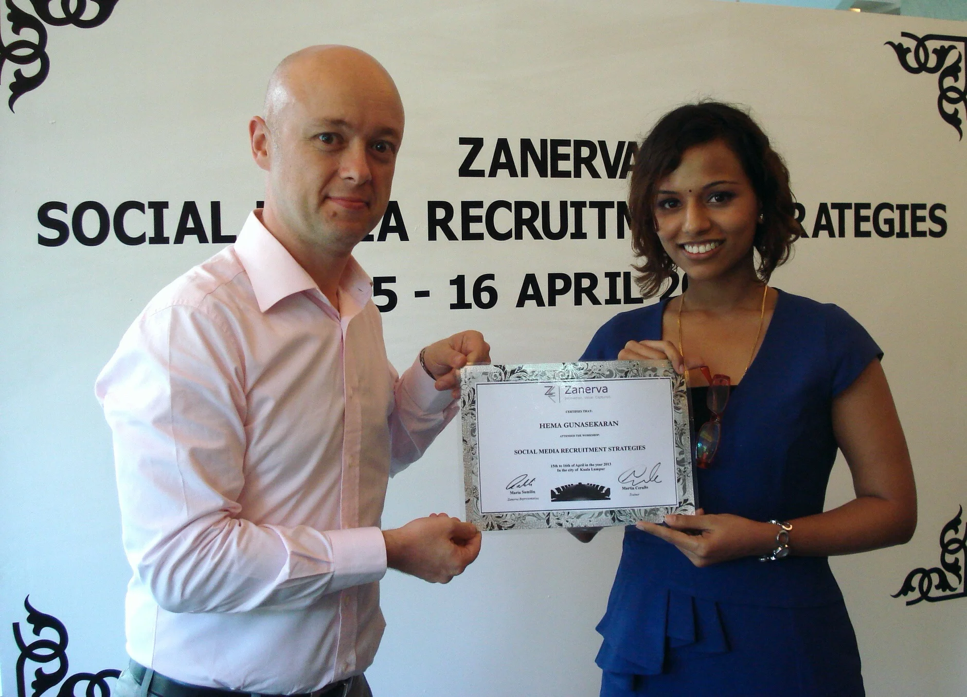 Hema Gunasekaran, Recruitment Assistant Manager from DKSH Malaysia Sdn Bhd receiving her certificate of participation for attending the Social Media Recruitment Strategies Workshop in Kuala Lumpur