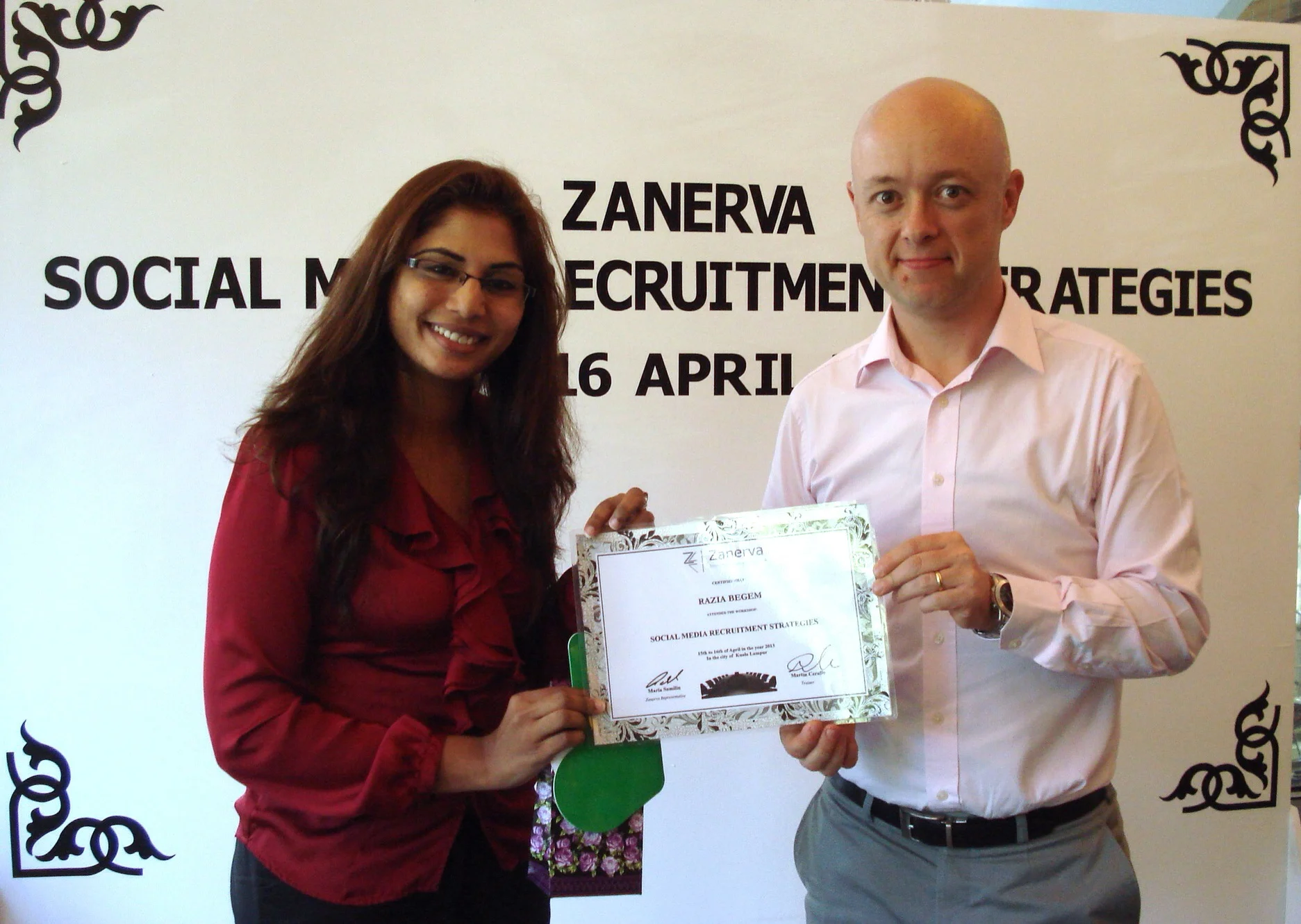 Razia Begem, Recruitment Lead at Xchanging Asia Pacific Sdn Bhd receiving her certificate of participation for attending the Social Media Recruitment Strategies Workshop in Kuala Lumpur