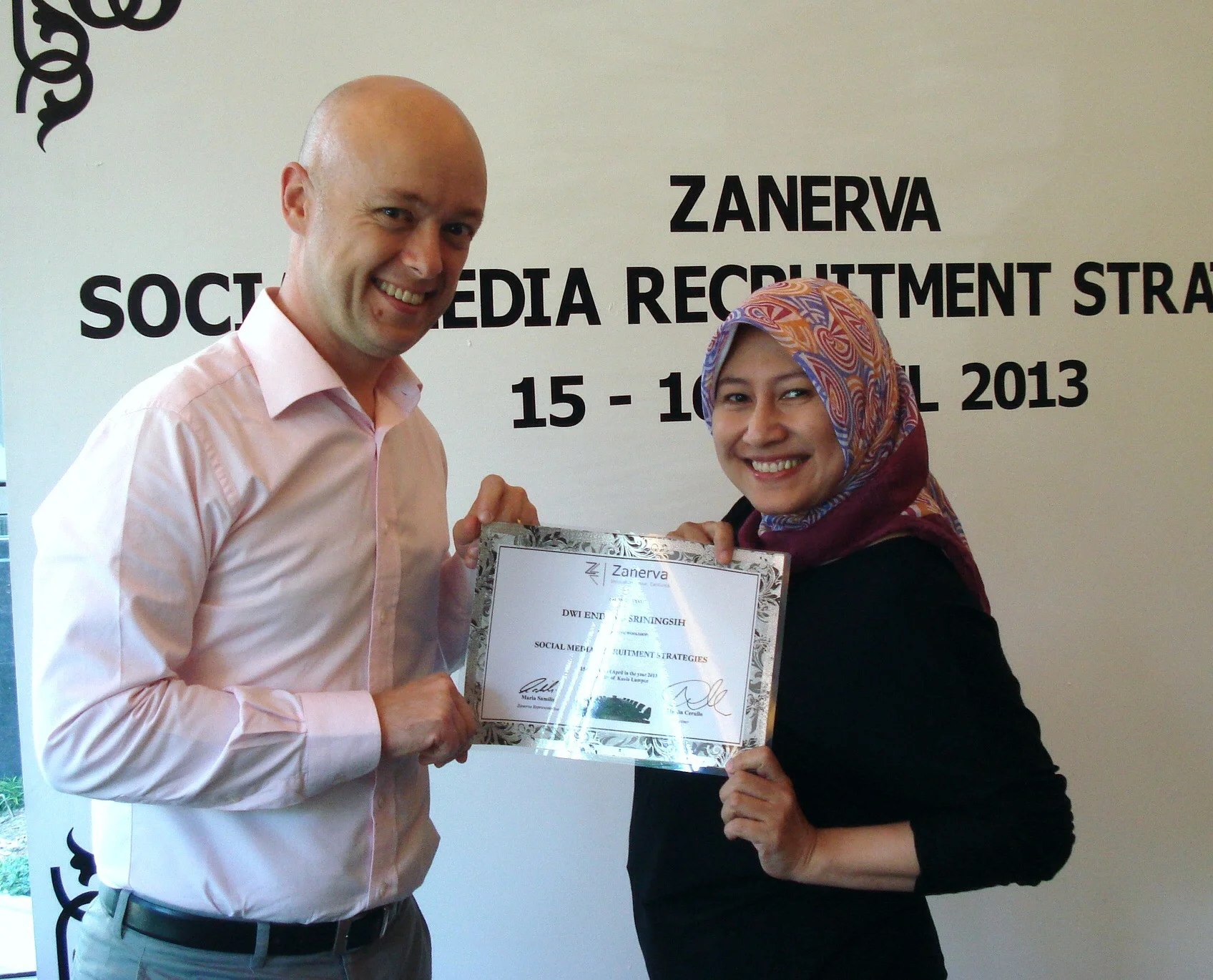 Dwi Endang Sriningsih, Recruitment Manager at Frisian Flag Indonesia receiving her certificate of participation for attending the Social Media Recruitment Strategies Workshop in Kuala Lumpur