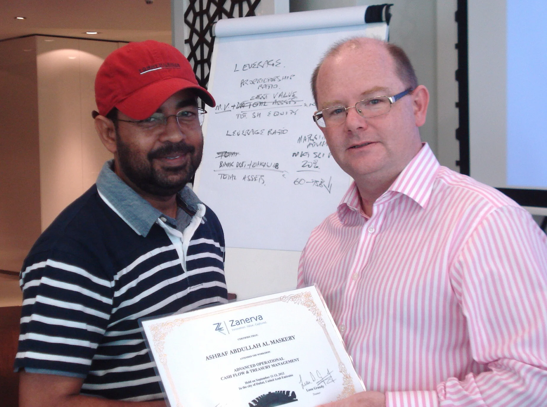 Ashraf Abdullah Al Maskery, Accountant at The Wave Muscat receiving his certificate of participation for attending the Advanced Operational Cash Flow & Liquidity Risk Management workshop in Dubai