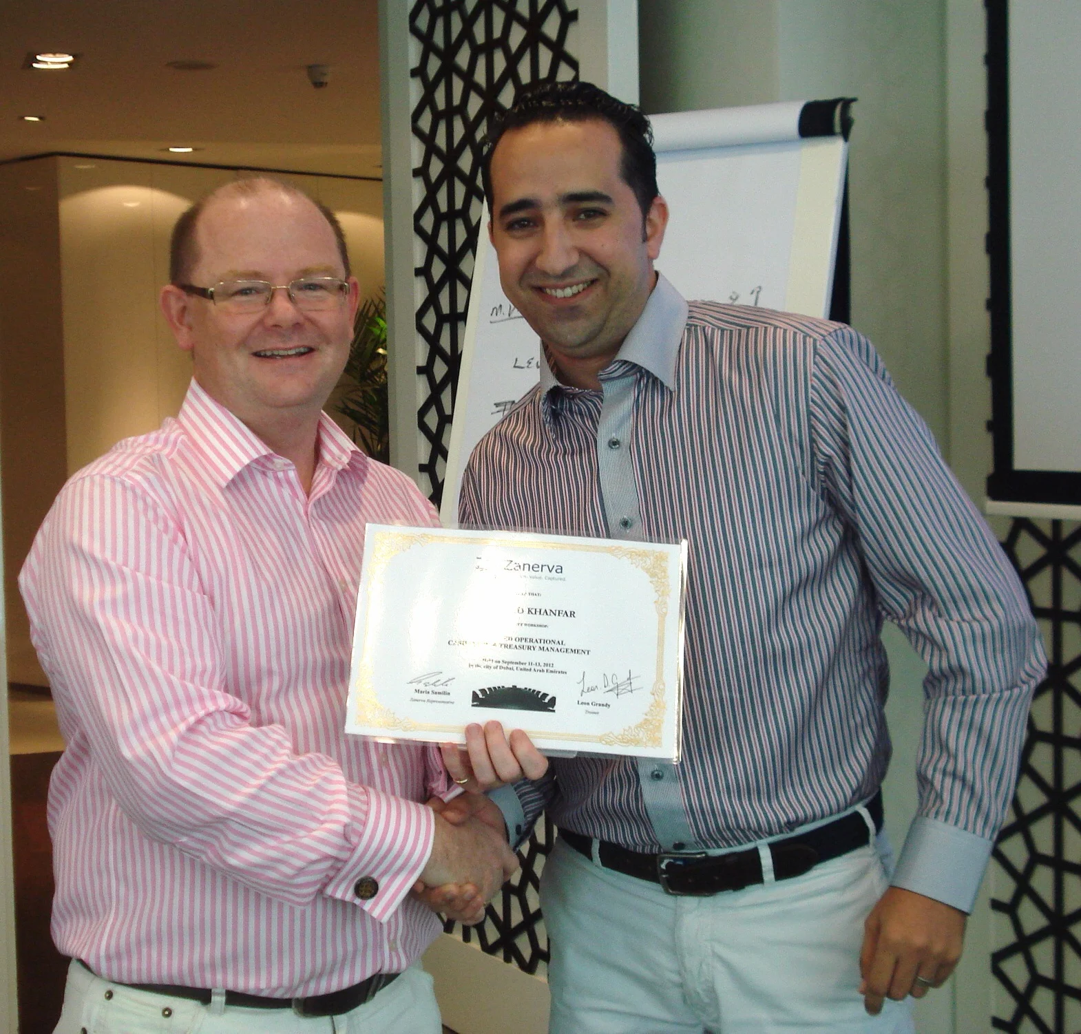 Tariq Ziad Khanfar, Accounting Supervisor at Jordan Bromine Company Ltd receiving his certificate of participation for attending the Advanced Operational Cash Flow & Liquidity Risk Management workshop in Dubai