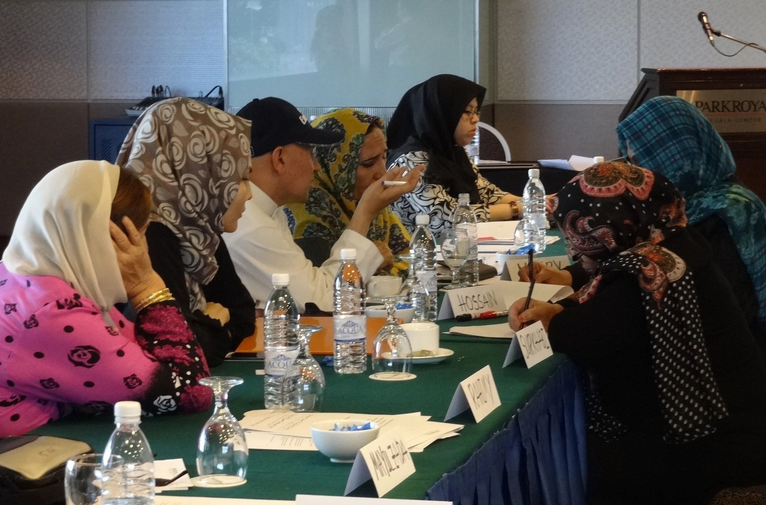   The MPs preparing arguments against the motion during debate session on the last day of the workshop.  